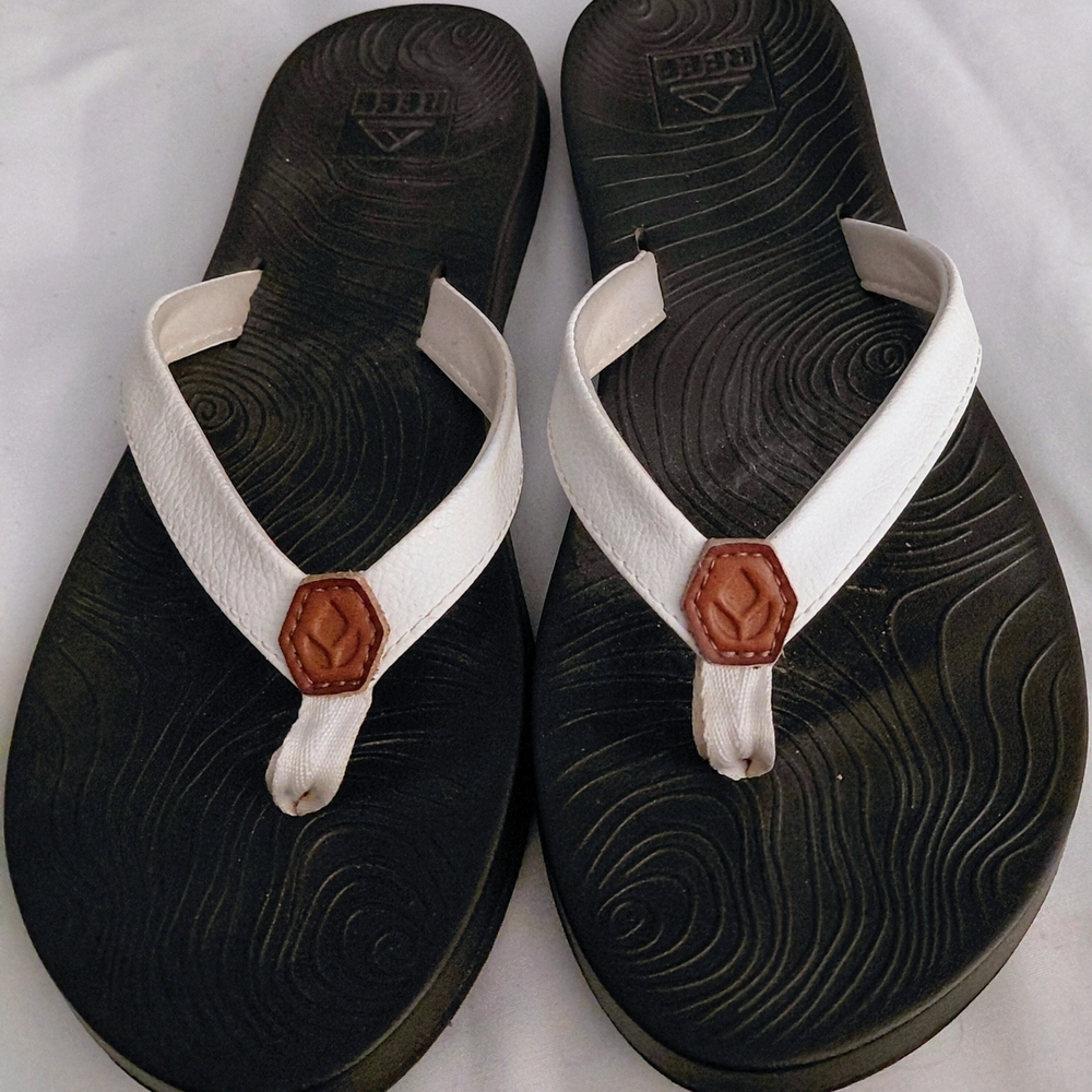 Reef Women's Black Footbed White Strap Sandals with Brown Accent